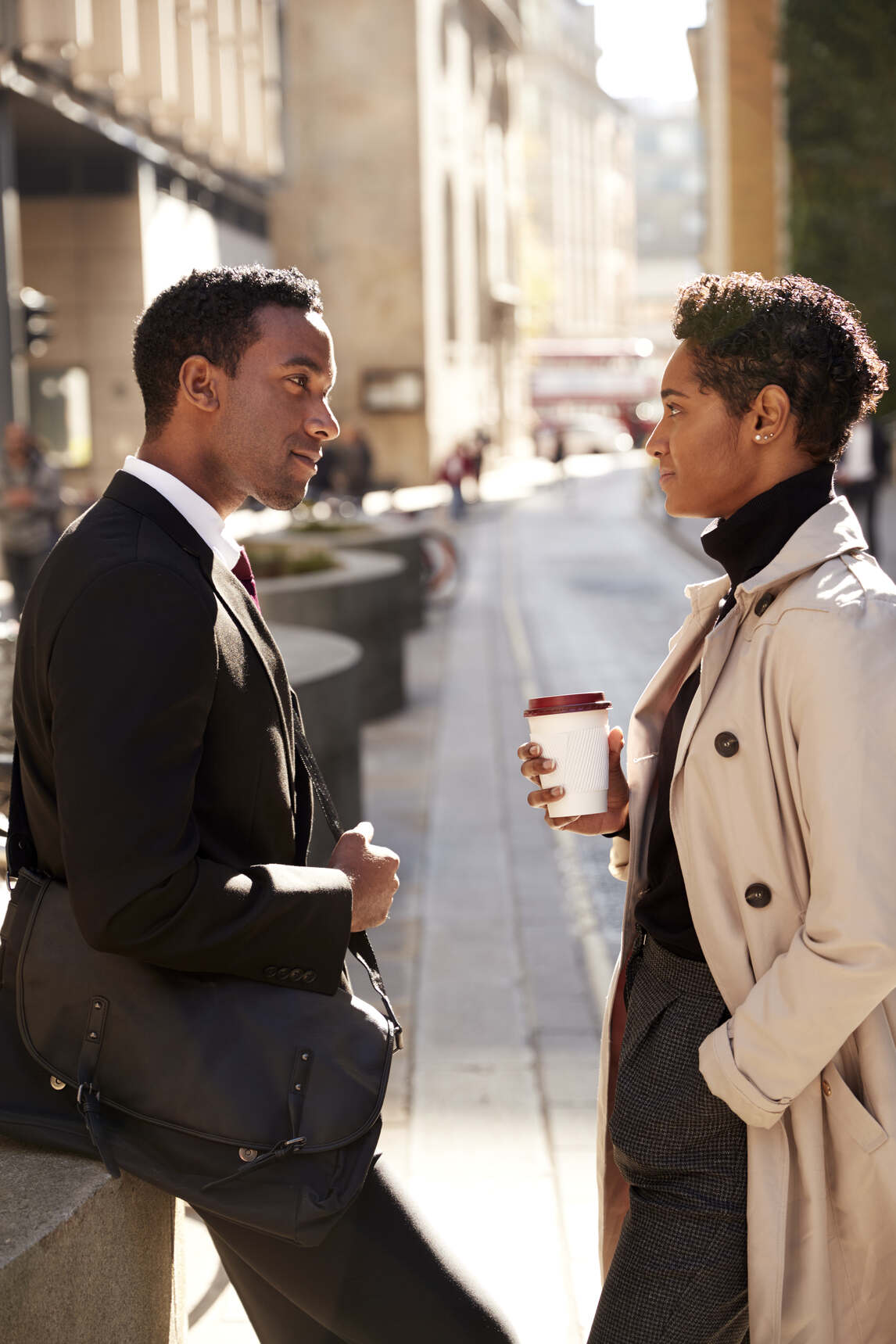 two-coworkers-talking-over-coffee - MATCH MADE COFFEE